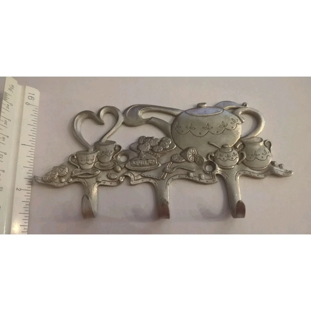 Practical solid pewter three-hook wall hanger in a teapot design